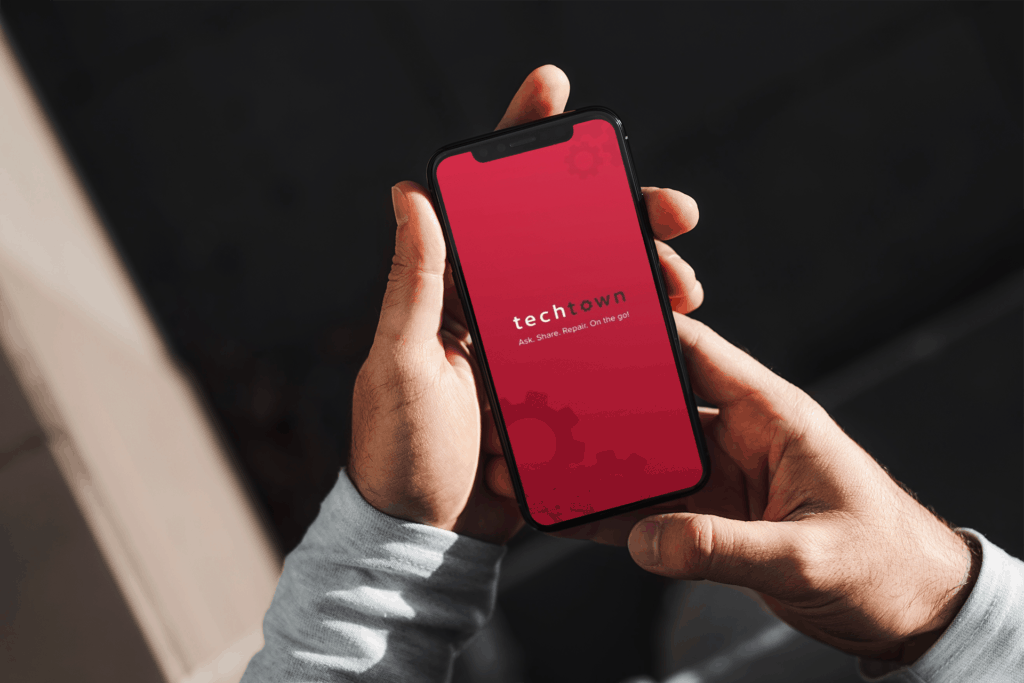 mockup of a man holding an iphone 11 pro with both hands 2127 el1 1024x683 1