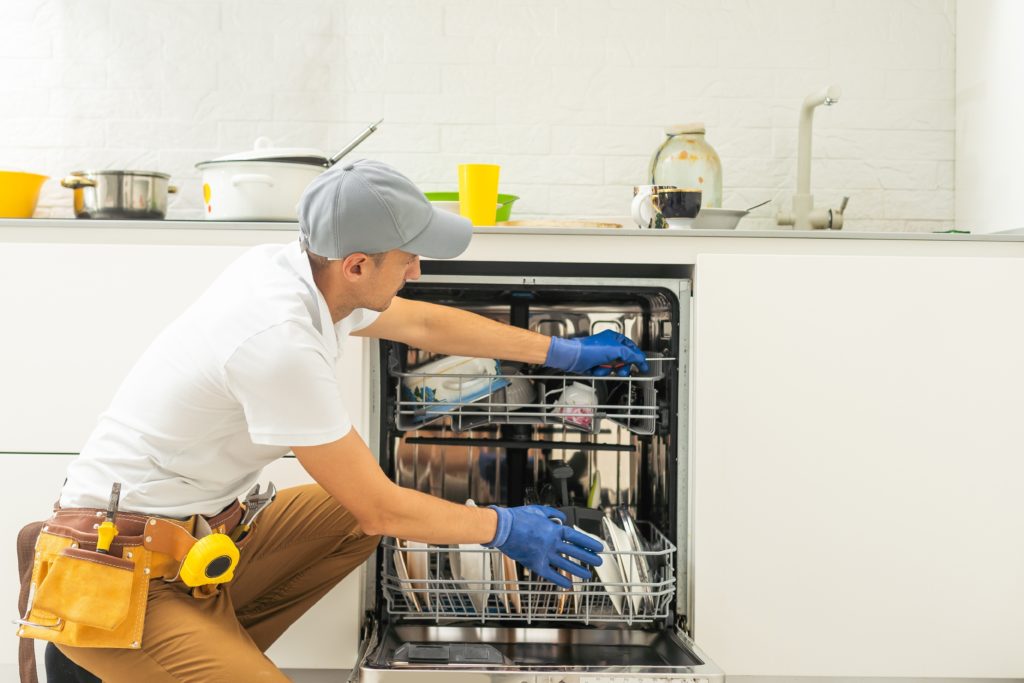 Certified repair technician fixing a dishwasher-Right to repair act